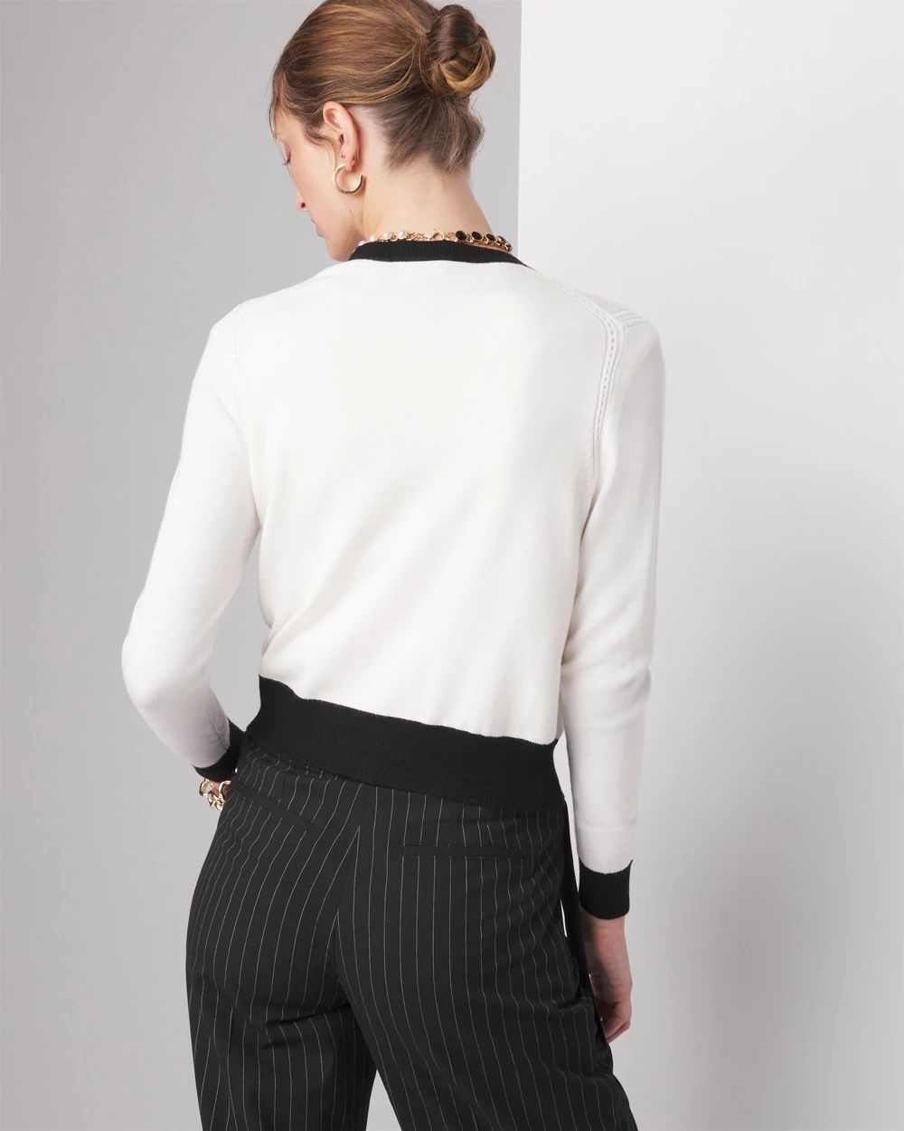 Black and white color block sweater on sale